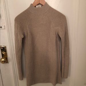 Stunning High neck sweater with open back